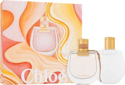 A gift set of Chloé Nomade Eau de Parfum, including a 50ml bottle and a 100ml body lotion, presented with its packaging.