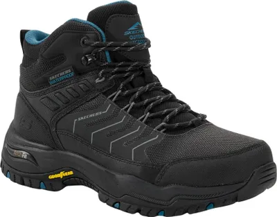 A single black hiking boot with blue accents is shown against a white background.