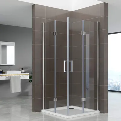 A modern bathroom with a glass shower enclosure.
