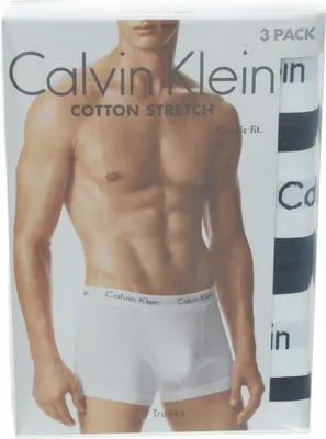 A package of Calvin Klein men's boxer briefs with a model wearing the product.