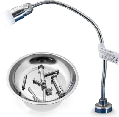 A magnetic work light with a flexible gooseneck and a magnetic dish containing fasteners.