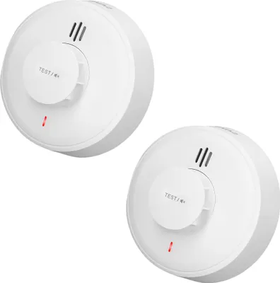 Two white smoke detectors are shown against a white background.