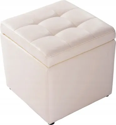 A cream-colored storage ottoman with a tufted lid.