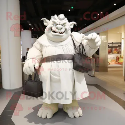 Produktbild von Weißer REDBROKOLY Oger Maskottchen Kostüm charakter bekleidet mit einem Faltenrock und Handtaschen