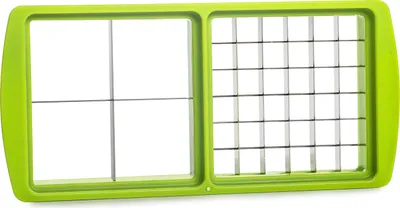 A top-down view of a green plastic vegetable dicer with metal blades.