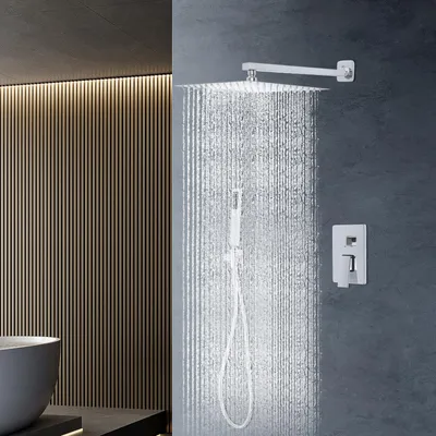A modern bathroom with a shower system in use.