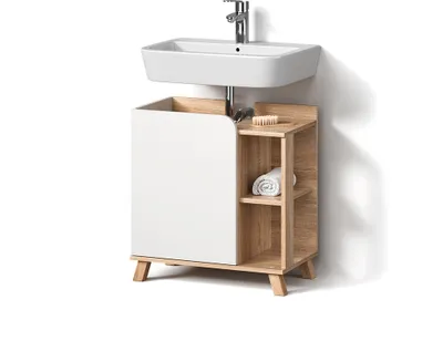A bathroom vanity with a sink and storage.