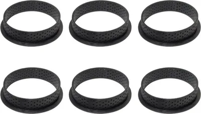 Six black perforated tart rings are arranged in two rows of three on a white background.