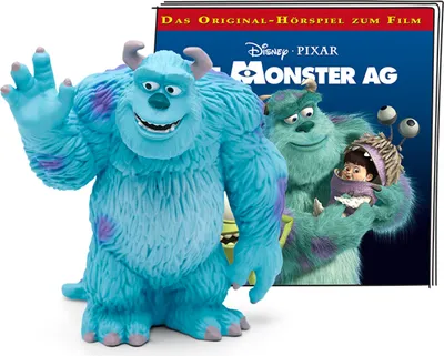 A toy figure of Sully from Monsters, Inc. is in the foreground, with a DVD or CD cover of Monsters, Inc. in the background.