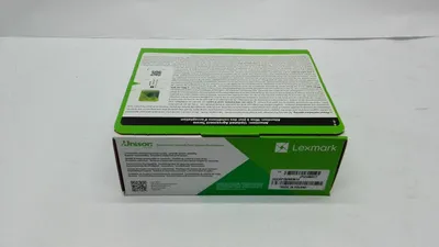 A product box for a Lexmark toner cartridge is shown against a plain background.
