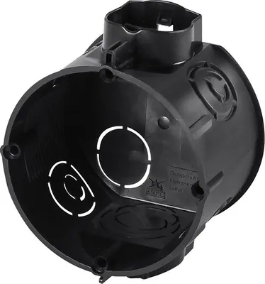 A black electrical junction box with multiple openings for cables.