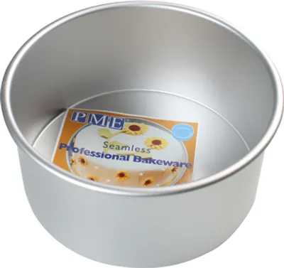 A round cake pan with a label inside.