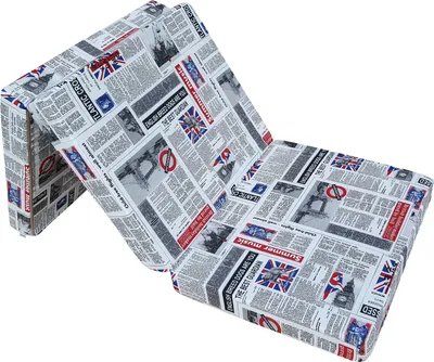 A folded mattress with a newspaper and Union Jack print.