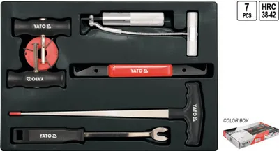 A set of automotive tools laid out in a black case.
