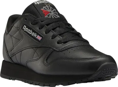 A black Reebok Classic Leather sneaker shown from a side-angle.