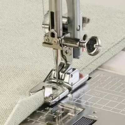Obrázok produktu pre Pätka podvíjajúca (obrubovacia) 3mm 202044008 JANOME