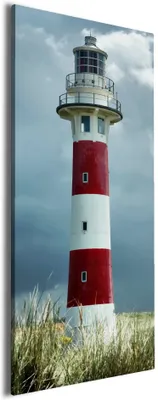 Produktbild von Wallario Premium Leinwandbild Leuchtturm am Strand in Größe 30 x 75 cm
