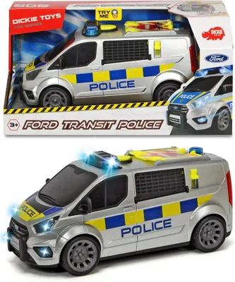 A toy Ford Transit police van is shown in its packaging and also displayed outside of the packaging with lights on.