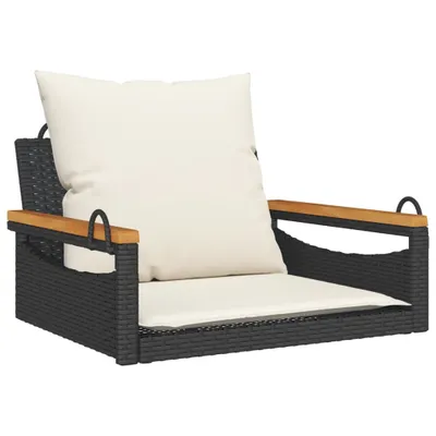 A black rattan hanging chair with a cream cushion, shown against a white background.