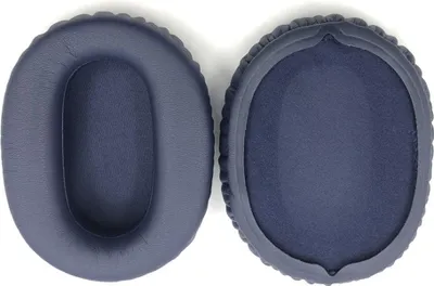 Two blue ear pads for headphones are shown side-by-side on a white background.