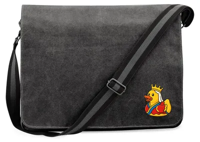 Produktbild von Huuraa Umhängetasche Quietscheente Königin Gummiente Queen 14 Liter Black Canvas Laptoptasche Geschenkidee