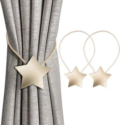 Immagine prodotto di Unyqoos® - Supporti magnetici per tende a forma di stella – Clip decorative per tende in metallo, con forte magnete, nastro da 40 cm, stella di 6x5,8 cm, confezione da 2 pezzi