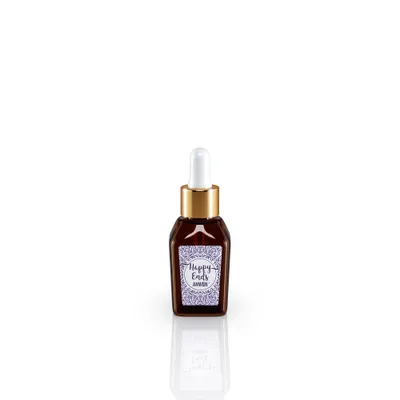 A small brown glass bottle with a dropper lid, featuring a label with purple decorative text.