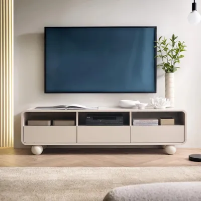 Produktbild von Orion TV-Lowboard 160 cm in Kaschmir mit drei Schubladen, offenen Fächern und abgerundeten Seiten auf kugelförmigen Füßen – modern und praktisch