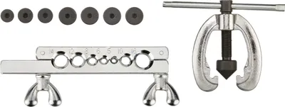 A set of pipe flaring tools and dies on a white background.