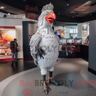 Image de Costume mascotte REDBROKOLY de coq argenté habillé d un legging et de bretelles