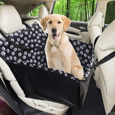 Produktbild von Hundeautositz mit Sicherheitsgurt, Hundebox für den Rücksitz, Zugang für den Vordersitz, wasserdichtes Hundebett, Messabmessungen 68 x 57 x 33 cm.