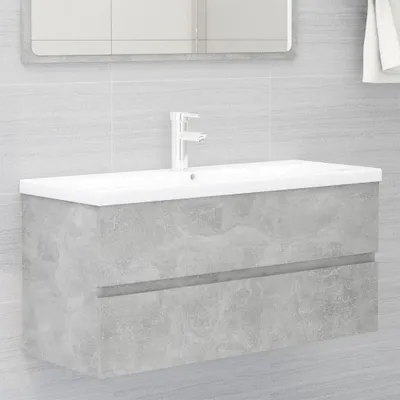 Imagen del producto de El mueble bajo lavabo de The Living Store. Lavabo integrado. Color gris cemento. Fabricado en material de madera