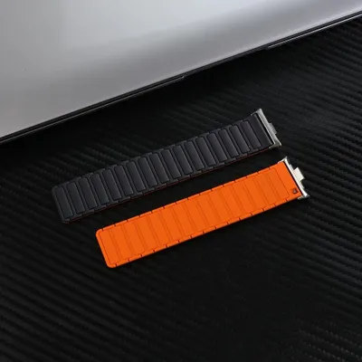 Immagine prodotto di Bracciale in silicone per smartwatch - Redmi Watch 4 - Chiusura magnetica - Bracciale sportivo morbido - Nero/Arancione
