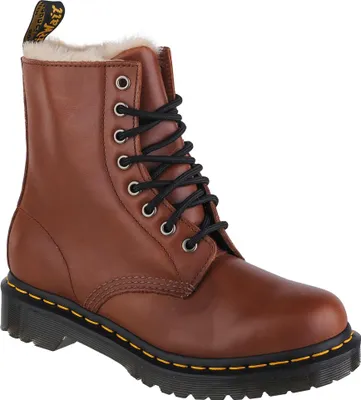 A single brown Dr. Martens boot with black laces and white fur lining, shown against a white background.