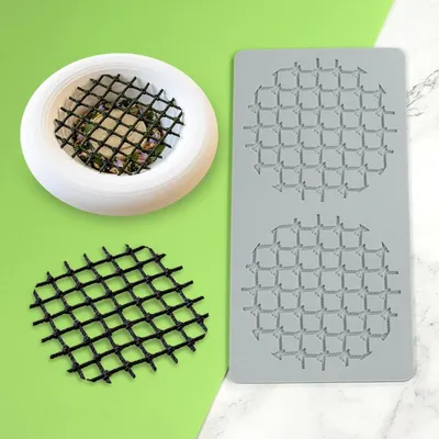 Productafbeelding van Siliconen mal met spitzendesign, visnetmotief, afmetingen 22,5 x 11,5 x 0,4 cm, geschikt voor het decoreren van taarten met fondant
