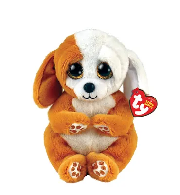 A plush toy dog sitting on a white background.