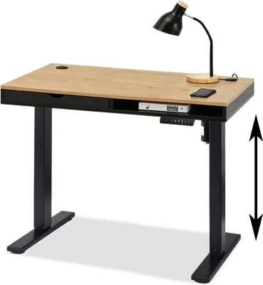A standing desk with a desk lamp and a phone on it, shown from a front-side angle.