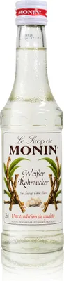 A bottle of Monin syrup on a white background.
