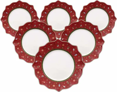 A set of six dinner plates arranged in a fan shape on a white background.