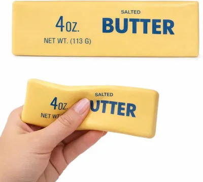 Produktbild von Lustiger Anti Stress Knautschball in Butter-Optik | Squishy zum Drücken, Quetschen & Kneten | Einzeln, Butterfarben