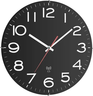 A black wall clock with white numbers and hands.