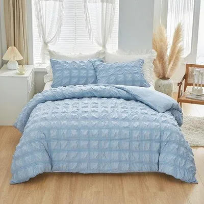 Produktbild von Unyqoos® Seersucker-Bettwäsche 135 x 200 cm, 2-teilig blau kariert, 100% Mikrofaser, inkl. 80 x 80 cm Kissenbezug, atmungsaktiv, mit Reißverschluss