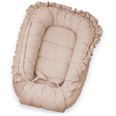 Produktbild von DOLCE SONNO Baby Nestchen – Multifunktionales Kuschelnest - Musselin-Baumwolle - 56x113 cm – Neugeborene Babynest – Beige
