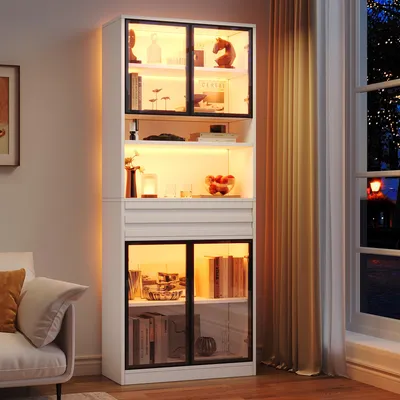Produktbild von STILVORA Vitrinenschrank mit 4 Glastüren und APP-gesteuerter RGB LED-Beleuchtung, Bücherschrank mit Schublade, Hochschrank für Wohnzimmer, Weiß