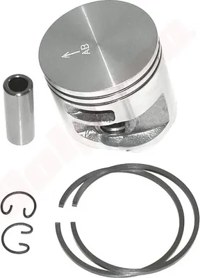 A set of engine parts, including a piston, wrist pin, and piston rings, laid out on a white background.