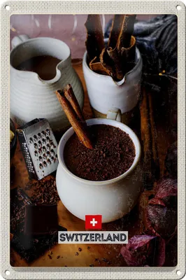 Produktbild von Blechschild Reise 20x30cm Schweiz Dessert Schokolade Zimtstange