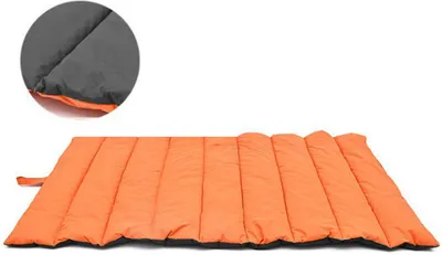 An orange and gray pet mat laid out flat.