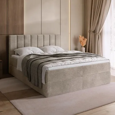 A bedroom scene featuring a bed.