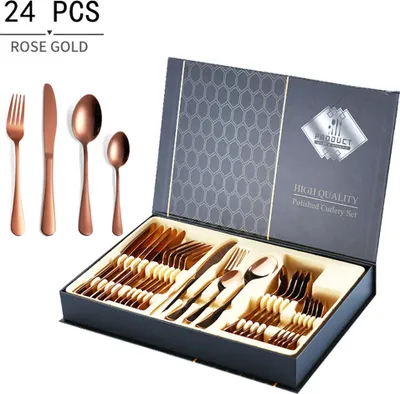 A rose gold cutlery set in a gift box, with individual pieces displayed next to it.