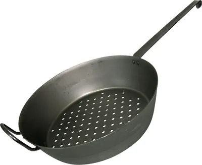 A black metal pan with a long handle and perforations on the bottom, shown against a white background.